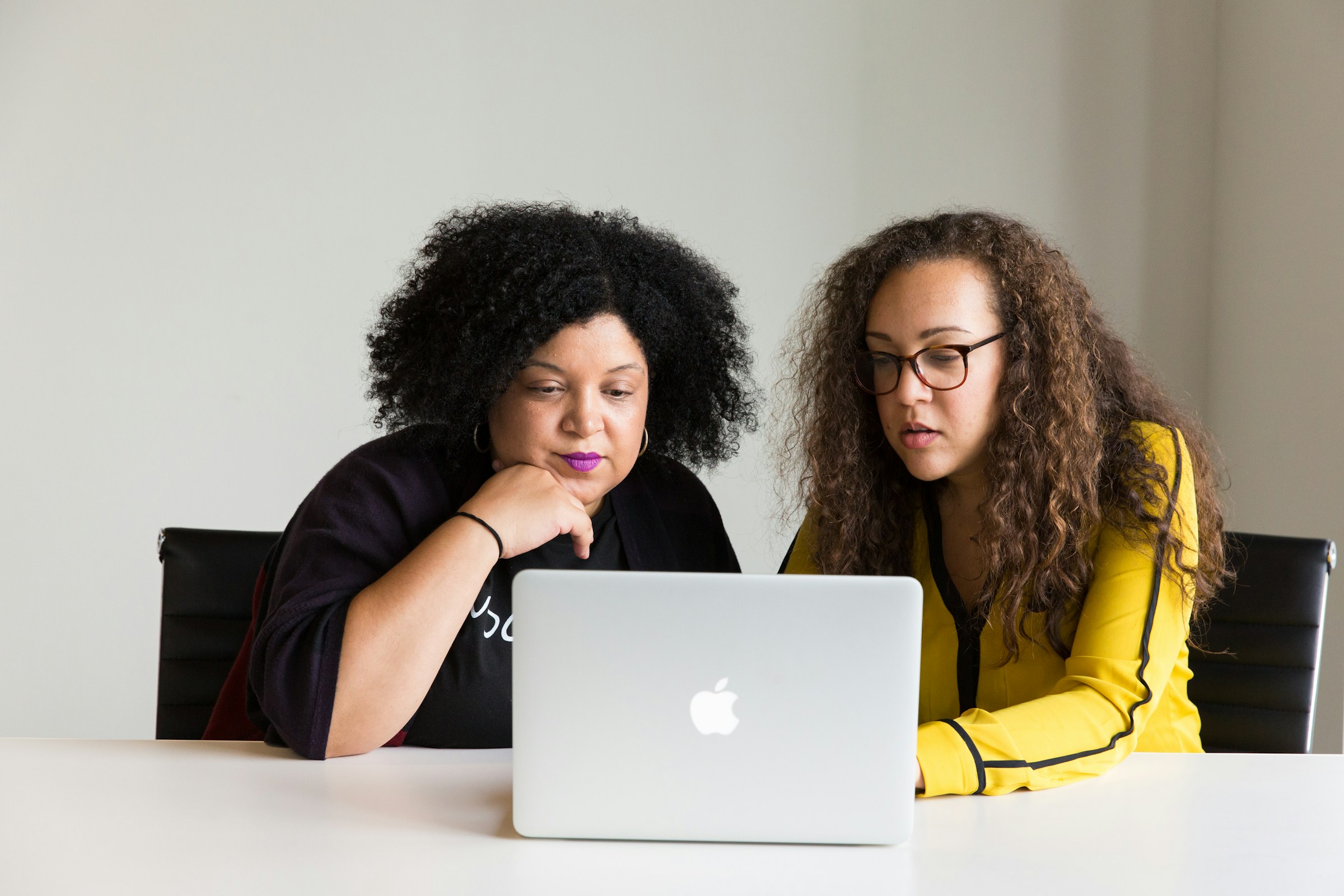 woman looking at computer - Examples of Great Email Subject Lines